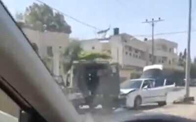 The scene of a car-ramming at Hawara in the West Bank, May 17, 2021 (Screen grab/Kan)