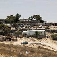A view of houses in the unrecognized Bedouin village of Sawaneen in Israel's southern Negev Desert, on June 8, 2021. (Hazem Bader/AFP)