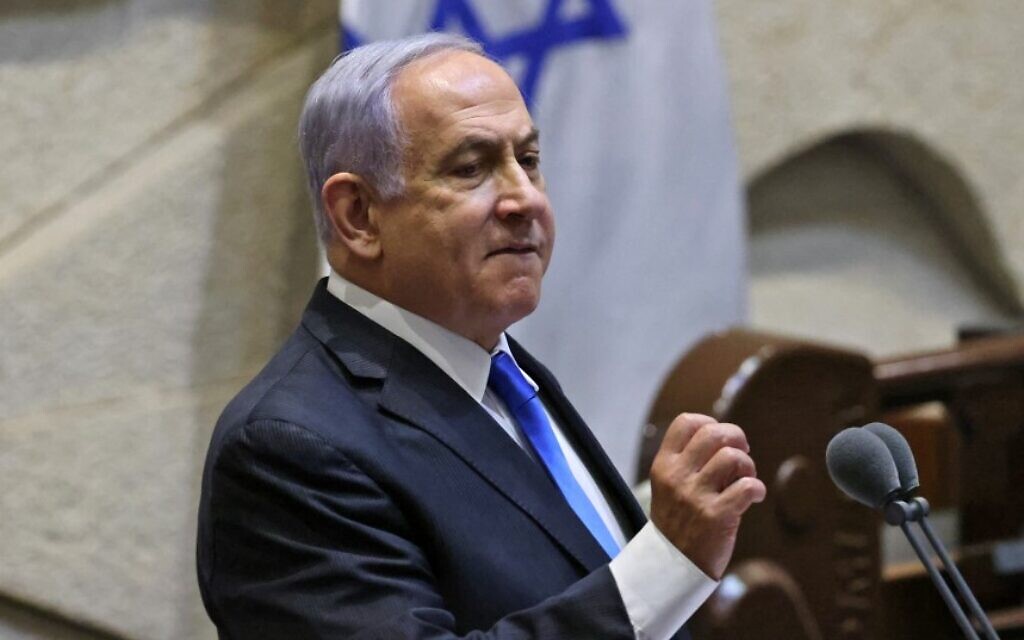 Israel's outgoing then-prime minister Benjamin Netanyahu addresses lawmakers during a special session to vote on a new government at the Knesset in Jerusalem, on June 13, 2021. (Emmanuel Dunand/AFP)