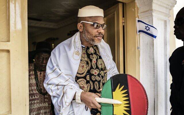 Leader of the Indigenous People of Biafra (IPOB) movement, Nnamdi Kanu, wears a Jewish prayer shawl as he leave his house in Umuahia, southeast Nigeria, to meet veterans of the Nigerian civil war, on May 26, 2017. (Marco Longari/AFP)