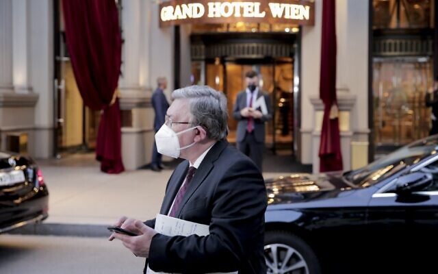 Russia's envoy to the International Atomic Energy Agency, Mikhail Ulyanov, stands in front of the Grand Hotel Vienna where closed-door nuclear talks with Iran take place, in Vienna, Austria, on Wednesday, June 2, 2021. (AP Photo/Lisa Leutner)