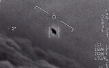 The image from video provided by the Department of Defense labelled Gimbal, from 2015, an unexplained object is seen at center as it is tracked as it soars high along the clouds, traveling against the wind. (Department of Defense via AP)