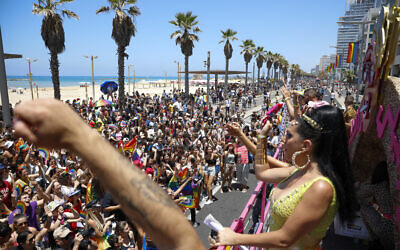 People participate in the annual Pride Parade, in Tel Aviv, Israel, Friday, June 25, 2021. (AP Photo/Ariel Schalit)