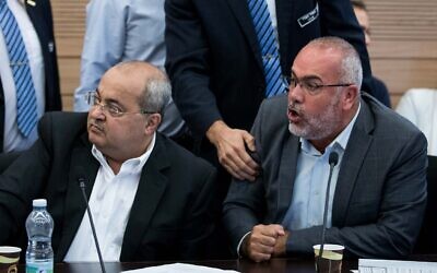 Knesset Members Osama Saadi (R) and Ahmad Tibi (L) attend a Knesset committee meeting on September 9, 2019. (Yonatan Sindel/Flash90)