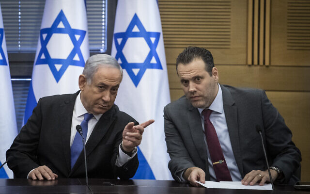 Prime Minister Benjamin Netanyahu and Likud MK Miki Zohar (R) at the Knesset in Jerusalem on November 20, 2019. (Hadas Parush/Flash90)