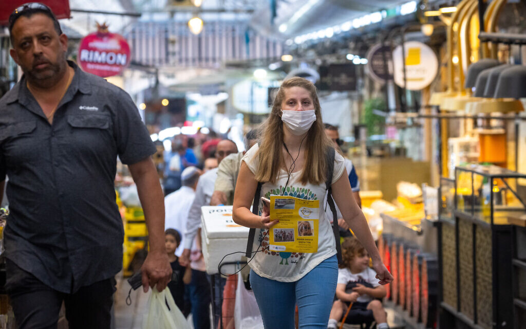 Israel drops indoor mask requirement Tuesday, as daily cases near zero