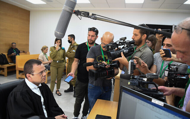 Benny Kuznitz, attorney for the family of a Military Intelligence officer who died in custody last month, speaks to reporters before a hearing in a military court in IDF headquarters in Tel Aviv on June 7, 2021. (Flash90)