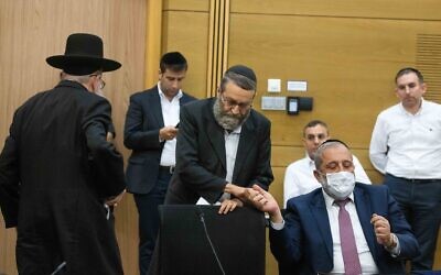 UTJ MK Yaakov Litzman (L) together with UTJ MK Moshe Gafni (2R) and Shas head Aryeh Deri (R) during a press statement at the Knesset, the Israeli parliament in Jerusalem, June 8, 2021.(Yonatan Sindel/Flash90)