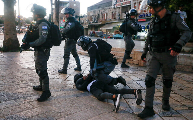 Palestinians clash with police during a protest at Damascus Gate in Jerusalem Old City, on June 17, 2021. (Jamal Awad/Flash90)