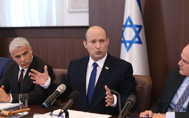 Prime Minister Naftali Bennett (C) leads a cabinet meeting at the Prime Minister's Office in Jerusalem, June 20, 2021. (Amit Shabi/POOL)