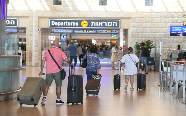 Travelers at Ben-Gurion International Airport near Tel Aviv on June 21, 2021. (FLASH90)