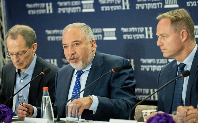 Finance Minister Avigdor Liberman (center) attends the Eli Horowitz Conference for Economy and Society, organized by the Israel Democracy Institute, in Jerusalem on June 29, 2021. (Yonatan Sindel/Flash90)