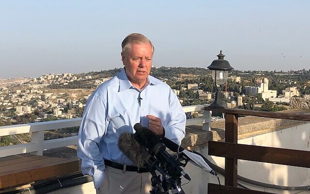 Senator Lindsey Graham (R-SC) speaks to reporters on the roof of Jerusalem's King David Hotel, June 1, 2021 (Lazar Berman/Time of Israel)