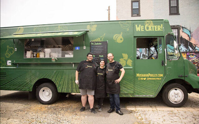 Chef Nir Sheynfeld, right, with colleagues at the Moshava food truck. (Moshava/Instagram)