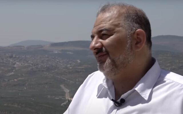 Ra'am leader Mansour Abbas speaks to the Kan public broadcaster during an interview from his home in the northern town of Maghar on June 3, 2021. (Screen capture: YouTube)