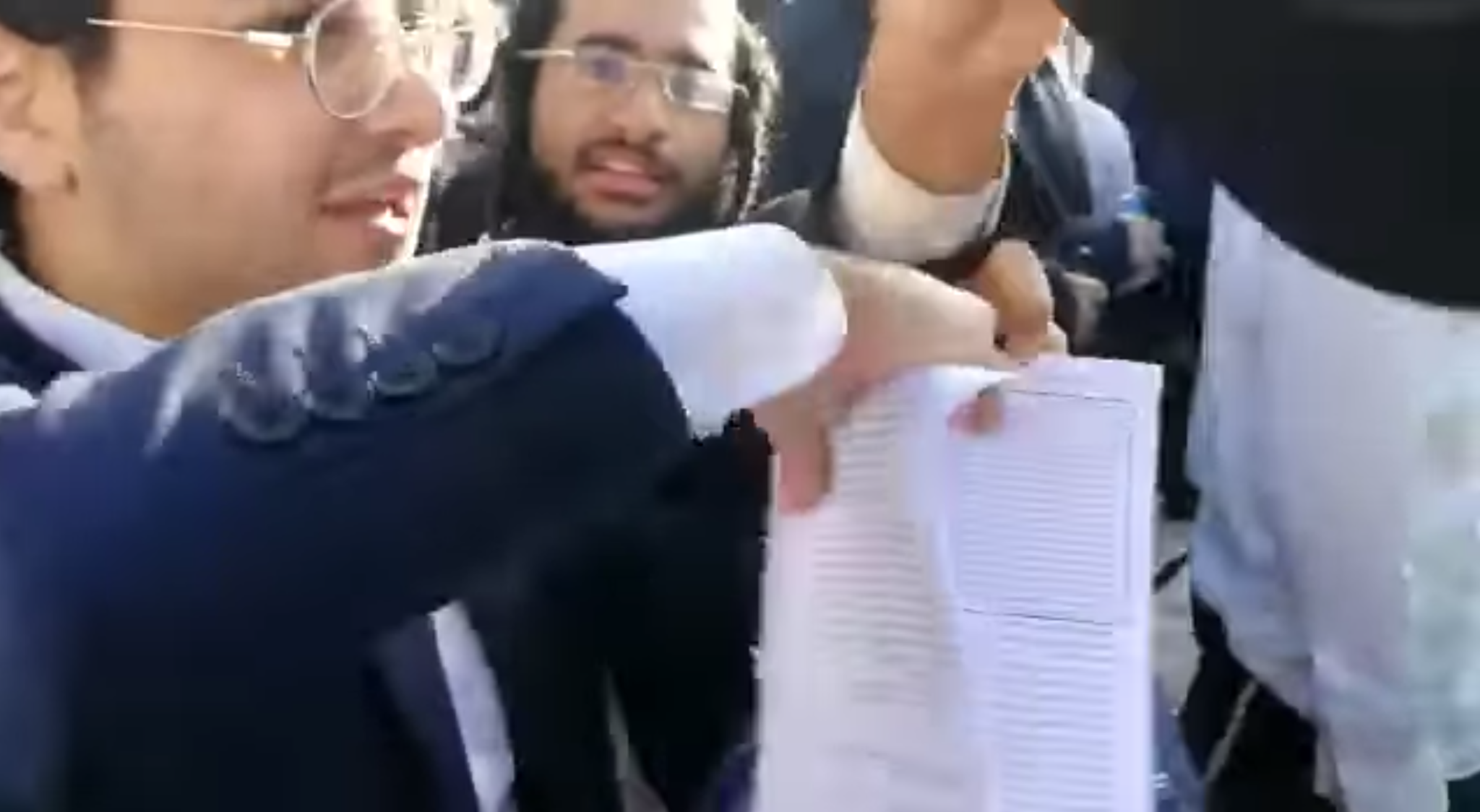 Haredi demonstrators harass Women of Wall worshipers, tear their prayer  books | The Times of Israel