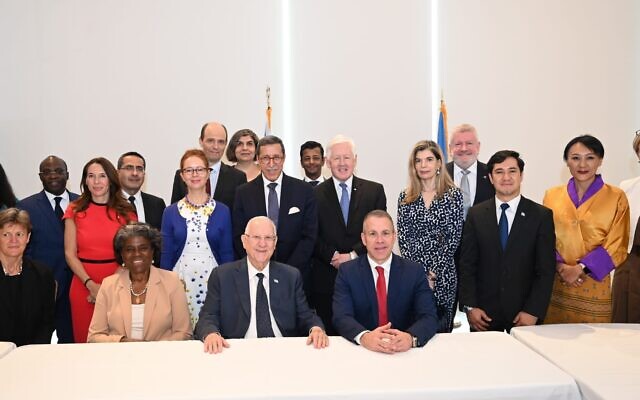 President Reuven Rivlin (middle seated) with a group of 21 UN ambassadors in New York on June 29, 2021. (Shahar Azran)