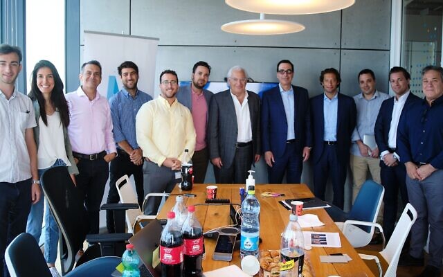 Yaron Carni, fourth from left, David Friedman, center, and Steven Mnuchin, sixth from left, at the offices of Maverick Ventures Israel meeting with local entrepreneurs; June 17, 2021 (Michael Novoselov, Perimiter81)