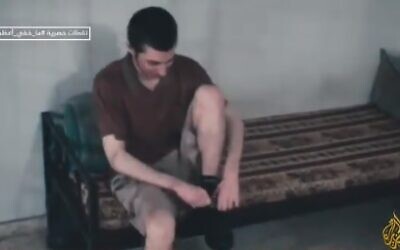 Gilad Shalit is seen during his time in Hamas captivity, in footage aired for the first time on June 6, 2021 (video screenshot)