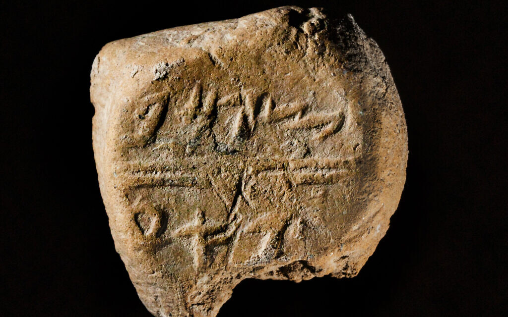 This stamp seal was found among other objects in a building near the remains of the First Temple-era wall protecting Jerusalem's eastern side. It bears the name Tsafan in ancient Hebrew script. (Koby Harati/ City of David)