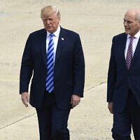 Then-US president Donald Trump and White House chief of staff John Kelly walk toward Air Force One at Andrews Air Force Base in Maryland, May 4, 2018. (AP Photo/Susan Walsh)