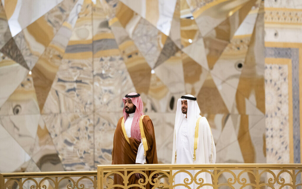 Saudi Crown Prince Mohammed bin Salman, left, attends a ceremony with Abu Dhabi Crown Prince Mohammed bin Zayed Al Nahyan at Qasr Al Watan in Abu Dhabi, United Arab Emirates, November 27, 2019. (Mohamed Al Hammadi/Ministry of Presidential Affairs via AP)