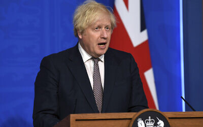 Britain's Prime Minister Boris Johnson speaks during a media briefing on coronavirus in Downing Street, London, on July 5, 2021. (Daniel Leal-Olivas/Pool Photo via AP)