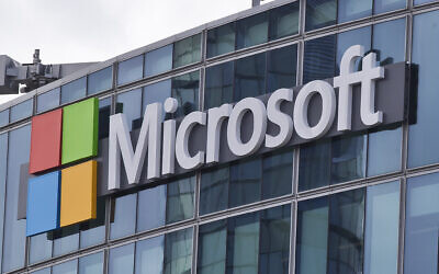 This file photo from April 12, 2016, shows the Microsoft logo in Issy-les-Moulineaux, outside Paris, France. (AP Photo/Michel Euler, File)