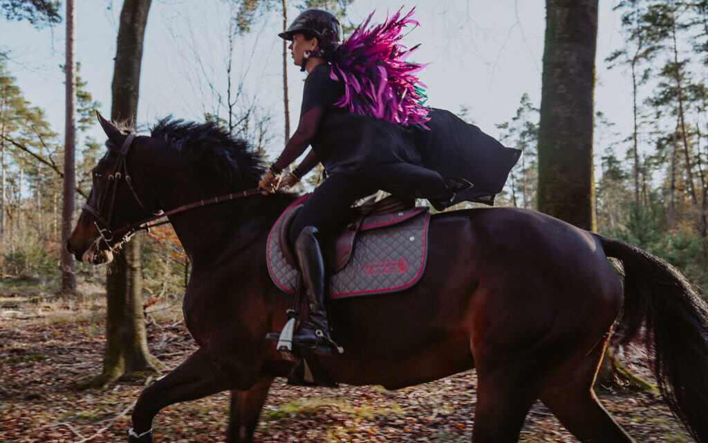 Dani G. Waldman atop her horse with her 'flying feathers.' (Courtesy)