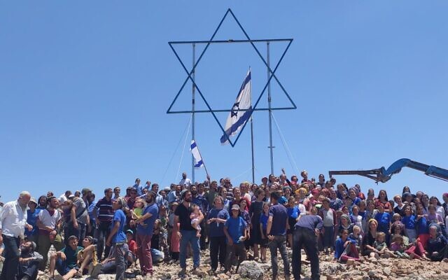 Settlers at the illegal West Bank outpost Evyatar before evacuating it as part of a deal with the government, July 2, 2021 (Courtesy)