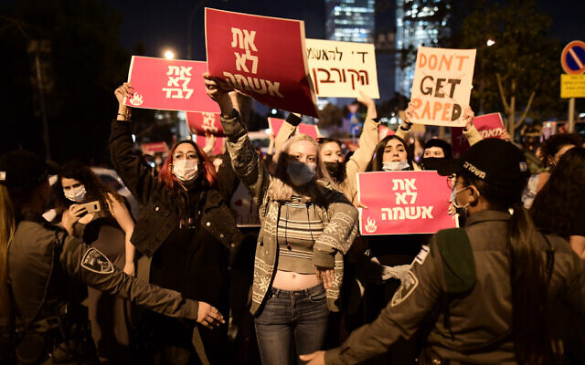 Israelis protest against a man charged with rape of a 13-year-old girl, in Tel Aviv on  March 15, 2021 (Tomer Neuberg/Flash90)