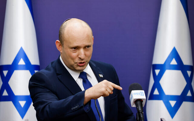 Prime Minister Naftali Bennett addresses a Yamina party meeting at the Knesset, on July 5, 2021. (Olivier Fitoussi/Flash90)