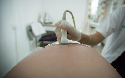 Illustrative photo of an ultrasound being done on a pregnant woman in Israel. (Chen Leopold/Flash90)