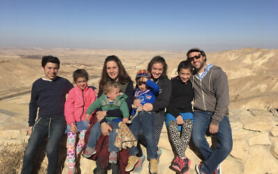 Susannah Schild with husband Avi and their six children on a hike in Israel's Negev Desert. (Courtesy)