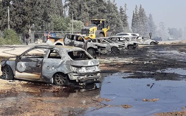 A number of vehicles were severely damaged in a fire near the Gan Hashlosha national park, on Saturday, July 3, 2021. (Israel Nature and Parks Authority)