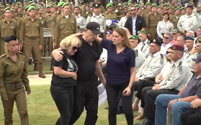 The funeral of IDF Commander Sharon Asman at the Kiryat Shaul military cemetery in Tel Aviv on July 4, 2021. (Screenshot/Kan) The funeral of IDF Commander Sharon Asman at the Kiryat Shaul military cemetery in Tel Aviv on July 4, 2021. (Screenshot/Kan)