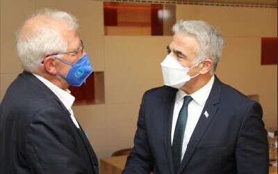 Foreign Minister Yair Lapid (right) and the European Union's top diplomat, Josep Borrell, in Brussels on July 11, 2021. (Twitter)