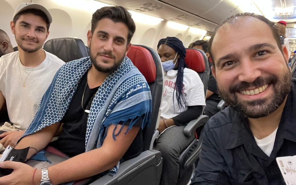 Three Israeli filmmakers held in Nigeria for 20 days pictured after their release, on their flight from Abuja to Istanbul before boarding a plane for Israel, July 28, 2021 (courtesy)