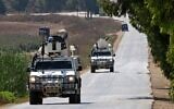A United Nations peacekeeping force in Lebanon (UNIFIL) convoy patrols the southern Khiam area near the border with Israel, on August 6, 2021. (Mahmoud Zayyat/AFP)