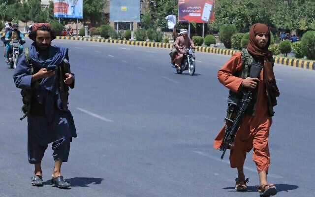 Taliban fighters patrol the streets in Herat on August 14, 2021. (AFP)