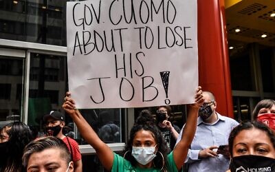 People participate in a protest against NY Governor Andrew Cuomo and protest for a moratorium on evictions on August 4, 2021 in New York City.  (Stephanie Keith/Getty Images/AFP)