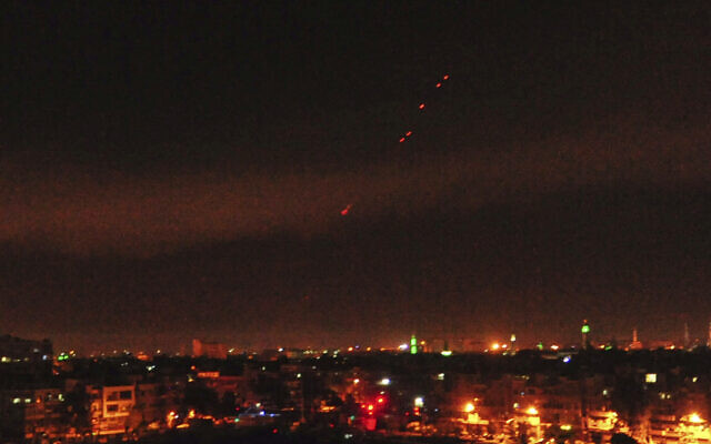 Illustrative: This photo released by the Syrian official news agency SANA shows anti-aircraft fire in the sky after US-led airstrikes targeting different parts of the Syrian capital Damascus in retaliation for the country's alleged use of chemical weapons early Saturday, April 14, 2018. Syrian air defenses responded to the joint strikes by the United States, France and Britain. (SANA via AP)