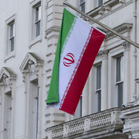The flag of the Islamic Republic of Iran flies outside its embassy in London, February 2014. (AP Photo/ Alastair Grant/ File)