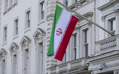 The flag of the Islamic Republic of Iran flies outside its embassy in London, February 2014. (AP Photo/Alastair Grant/ File)