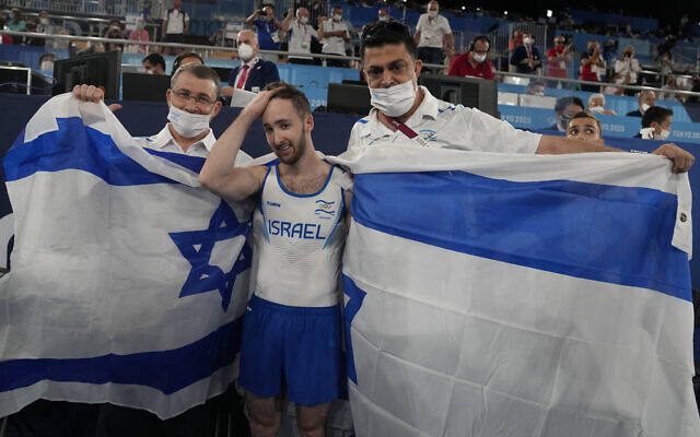 Artem Dolgopyat of Israel celebrates after winning the gold medal on the floor exercise during the artistic gymnastics men's apparatus final at the 2020 Summer Olympics, August 1, 2021, in Tokyo. (AP Photo/Natacha Pisarenko)