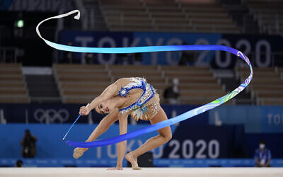 Israeli gymnast Linoy Ashram performs during the rhythmic gymnastics individual all-around final at the 2020 Summer Olympics, on Saturday, August 7, 2021, in Tokyo, Japan. (AP/Ashley Landis)