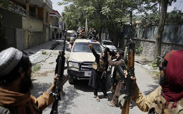 Taliban fighters patrol in Kabul, Afghanistan, on August 19, 2021. (AP/Rahmat Gul)
