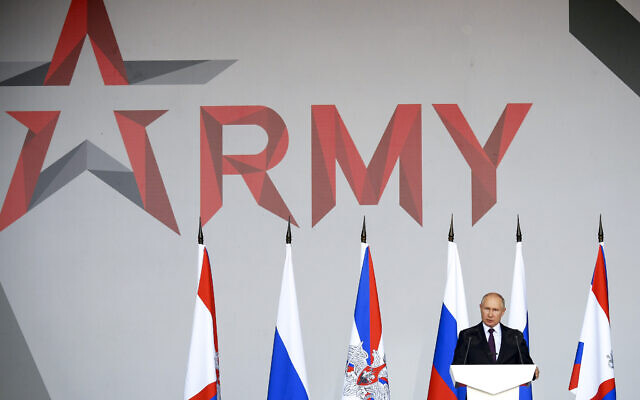 Russian President Vladimir Putin delivers his speech at the opening ceremony of the International Military Technical Forum Army-2021 in Alabino, outside Moscow, Russia, August 23, 2021. (Ramil Sitdikov, Sputnik, Kremlin Pool Photo via AP)