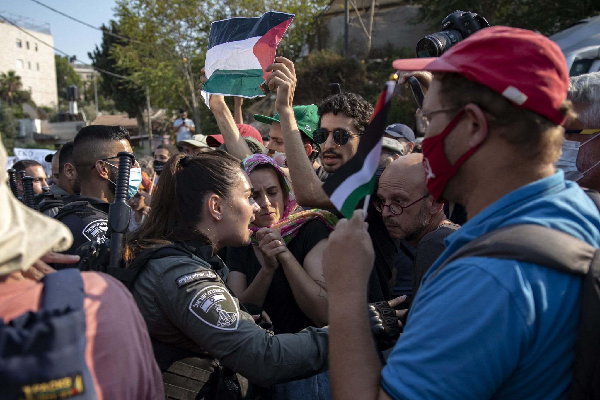 Protesters demonstrate in the East Jerusalem neighborhood of Sheikh Jarrah on July 30, 2021. (Olivier Fitoussi/Flash90)