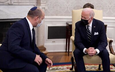 Prime Minister Naftali Bennett speaks as he meets with US President Joe Biden in the Oval Office of the White House, on Friday, August 27, 2021, in Washington, DC. (GPO)